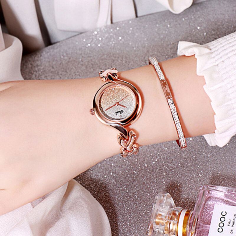Gedi Fashion Elegant Luxury Crystal Gradient Color Kellotaulu Metalliseos Hihna Naisten Rannekellot Rannekellot Kvartsikello