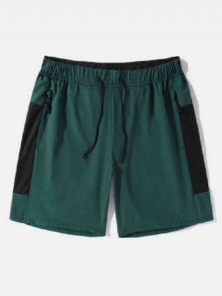 Miesten Colorblock Vetoketjutasku Keskipitkä Activewear-alaosa