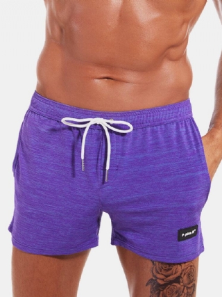 Miesten Urheilulliset Yksiväriset Quick Dry Pocket-shortsit
